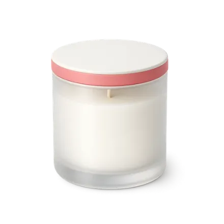 A scented candle in a glass jar